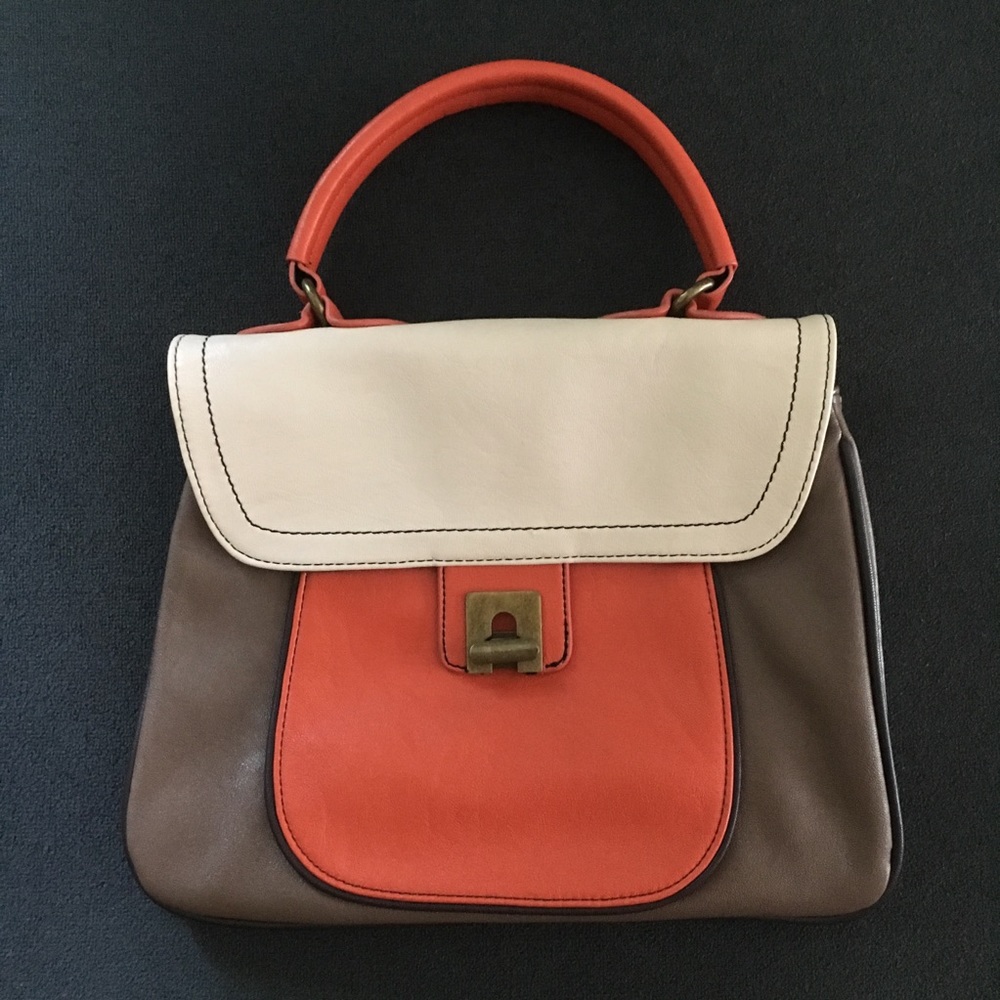 Stylish Forever 21 handbag with a cute handle.